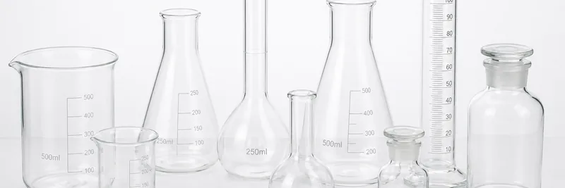 Borosilicate laboratory glassware group on a clean lab bench
